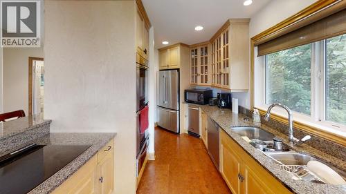 245 Rainbow Ridge Road, Procter, BC - Indoor Photo Showing Kitchen With Double Sink