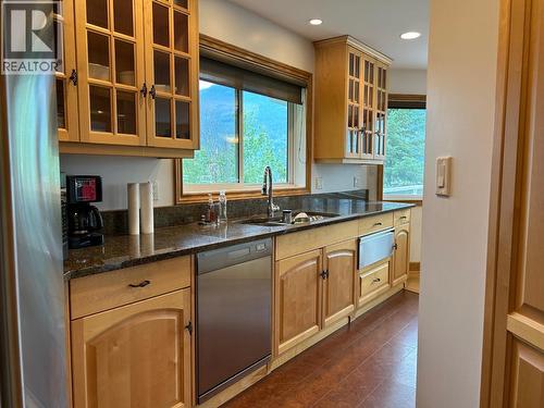 245 Rainbow Ridge Road, Procter, BC - Indoor Photo Showing Kitchen With Double Sink