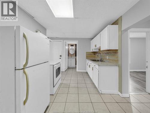 1153 University, Windsor, ON - Indoor Photo Showing Kitchen With Double Sink