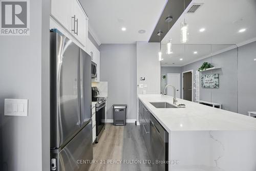 314 - 181 Village Green Square, Toronto, ON - Indoor Photo Showing Kitchen With Upgraded Kitchen