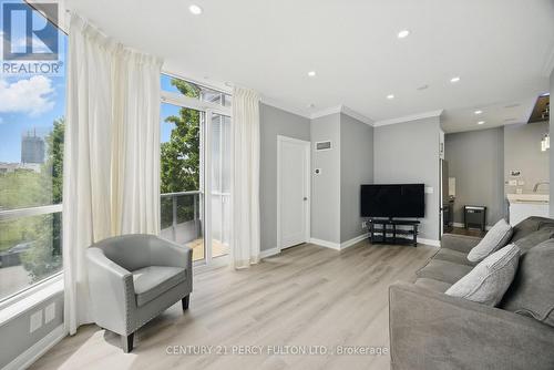 314 - 181 Village Green Square, Toronto, ON - Indoor Photo Showing Living Room