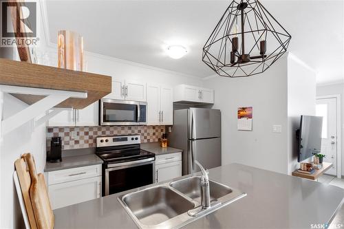 320 522 Cornish Road, Saskatoon, SK - Indoor Photo Showing Kitchen With Stainless Steel Kitchen With Double Sink