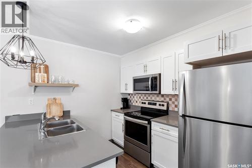 320 522 Cornish Road, Saskatoon, SK - Indoor Photo Showing Kitchen With Stainless Steel Kitchen With Double Sink