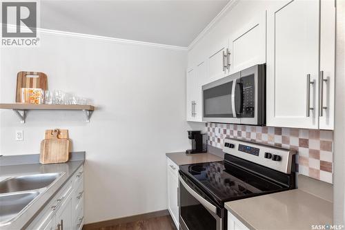 320 522 Cornish Road, Saskatoon, SK - Indoor Photo Showing Kitchen With Double Sink