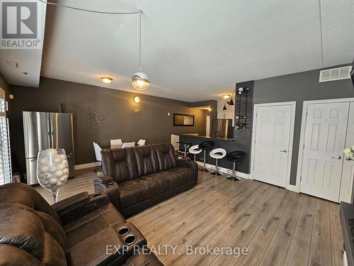 102 - 308 Watson Parkway N, Guelph, ON - Indoor With Fireplace