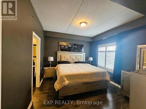 Entertainment area with b/i electric fireplace. - 102 - 308 Watson Parkway N, Guelph, ON - Indoor With Fireplace