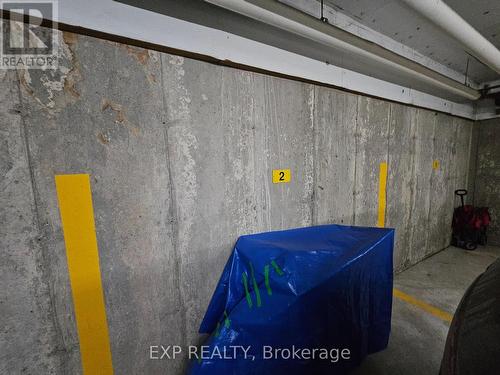 102 - 308 Watson Parkway N, Guelph, ON - Indoor Photo Showing Garage