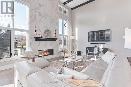 1 Windrose Valley Boulevard, Clearview, ON - Indoor Photo Showing Living Room With Fireplace