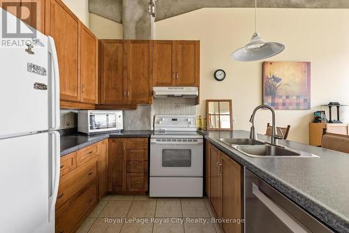 108 - 26 Ontario Street, Guelph (St. Patrick'S Ward), ON - Indoor Photo Showing Kitchen With Double Sink