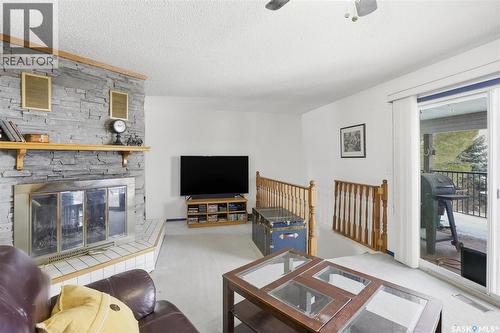 48 Procter Drive, Shields, SK - Indoor Photo Showing Other Room With Fireplace