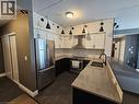 308 Watson Parkway N Unit# 102, Guelph, ON  - Indoor Photo Showing Kitchen With Stainless Steel Kitchen With Double Sink 