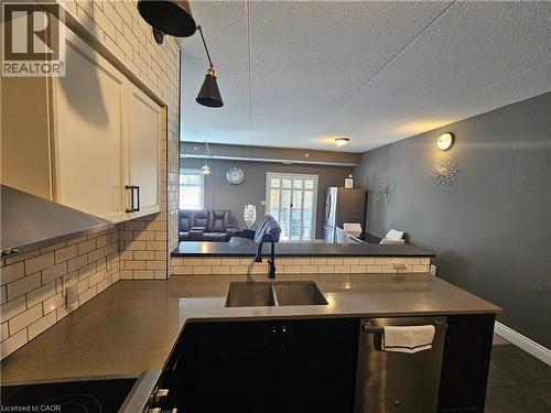 308 Watson Parkway N Unit# 102, Guelph, ON - Indoor Photo Showing Kitchen With Stainless Steel Kitchen With Double Sink