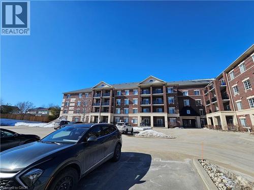 308 Watson Parkway N Unit# 102, Guelph, ON - Outdoor With Balcony With Facade