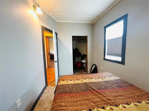 This second bedroom has a good sized walk in closet. - Pierson, Manitoba 