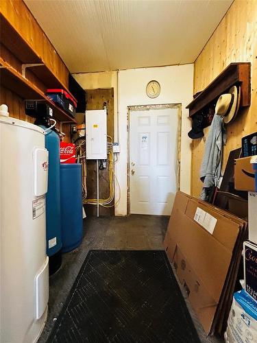 Utility room with entry to backyard. - Pierson, Manitoba 