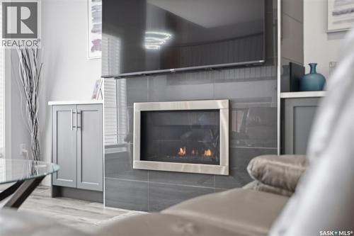 406 Hamm Lane, Saskatoon, SK - Indoor Photo Showing Living Room With Fireplace