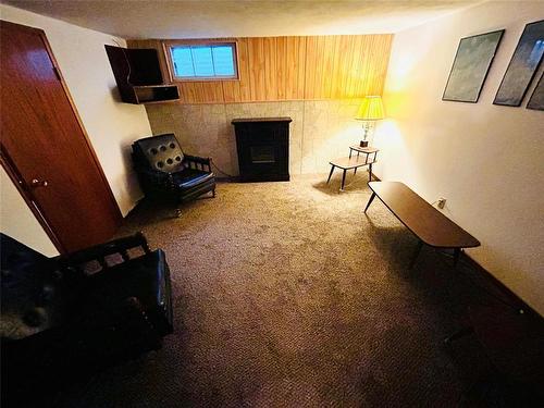 244 Centennial Crescent, Melita, MB - Indoor With Fireplace