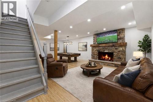 Virtually Staged - 16 Thornbush Crescent, Waterloo, ON - Indoor Photo Showing Living Room With Fireplace