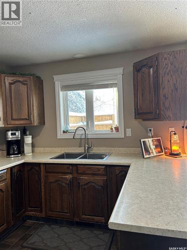 816 8Th Avenue, Rosthern, SK - Indoor Photo Showing Kitchen With Double Sink