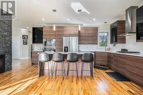 6470 Apple Orchard Road, Ottawa, ON - Indoor Photo Showing Kitchen With Fireplace With Upgraded Kitchen