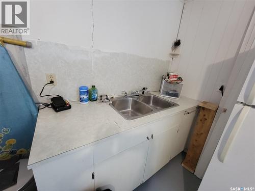 102 Jubilee Bay, Unity, SK - Indoor Photo Showing Kitchen With Double Sink