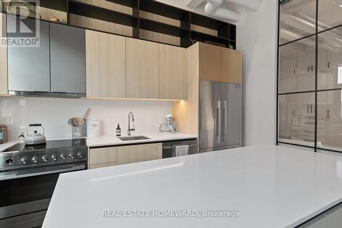 207 - 150 Logan Avenue, Toronto, ON - Indoor Photo Showing Kitchen