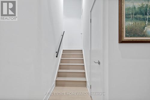 Stairs to Entry - 207 - 150 Logan Avenue, Toronto, ON - Indoor Photo Showing Other Room