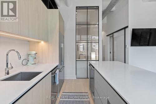 Fully Equipped Kitchen - 207 - 150 Logan Avenue, Toronto, ON - Indoor Photo Showing Kitchen