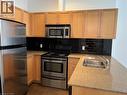 404 King Street W Unit# 409, Kitchener, ON  - Indoor Photo Showing Kitchen With Stainless Steel Kitchen With Double Sink 