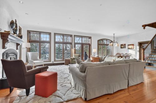 Living Room - 1015 Ch. Cochrane, Mont-Tremblant, QC - Indoor Photo Showing Living Room With Fireplace