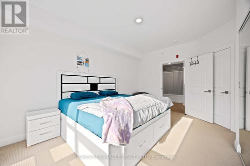 222 - 4040 Upper Middle Road, Burlington, ON - Indoor Photo Showing Bedroom