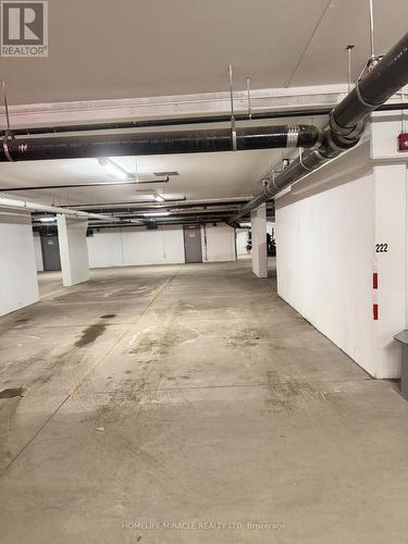 222 - 4040 Upper Middle Road, Burlington, ON - Indoor Photo Showing Garage