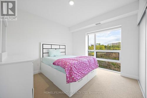 222 - 4040 Upper Middle Road, Burlington, ON - Indoor Photo Showing Bedroom