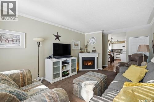 39 Bedford Crescent, Regina, SK - Indoor Photo Showing Living Room With Fireplace