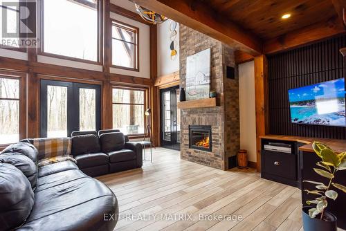 2191 Cassburn Road, Champlain, ON - Indoor Photo Showing Living Room With Fireplace