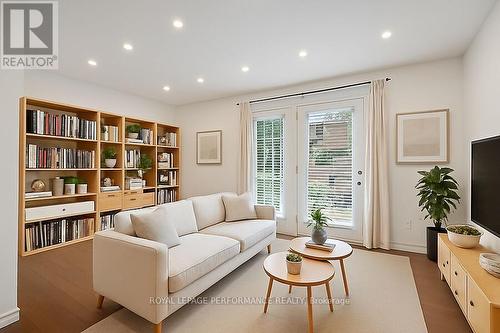 virtually staged living room - 2654 Draper Avenue, Ottawa, ON - Indoor Photo Showing Living Room