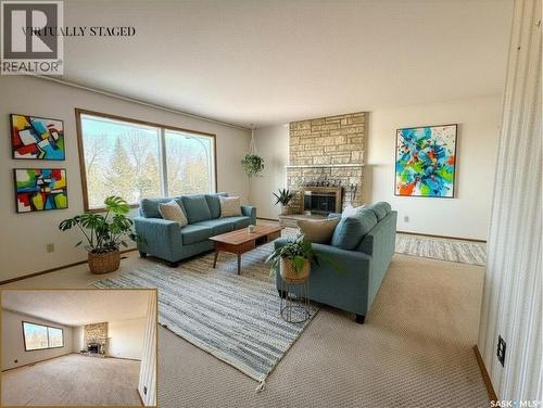 264 Hayes Drive, Swift Current, SK - Indoor Photo Showing Living Room With Fireplace