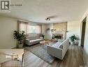 264 Hayes Drive, Swift Current, SK  - Indoor Photo Showing Living Room With Fireplace 