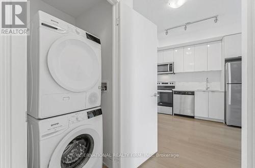 710 - 859 The Queensway, Toronto, ON - Indoor Photo Showing Laundry Room