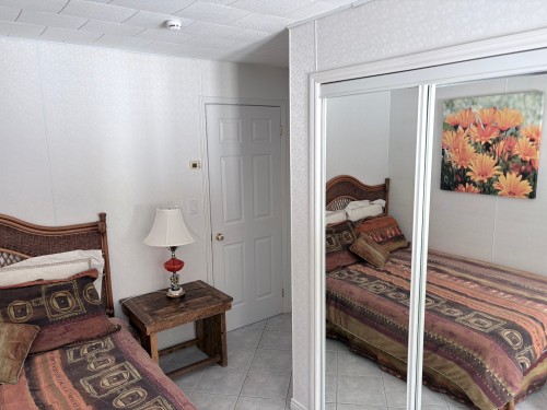 Chambre à coucher - 41 Route 138, Baie-Trinité, QC - Indoor Photo Showing Other Room