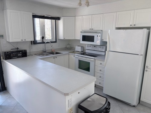 Cuisine - 41 Route 138, Baie-Trinité, QC - Indoor Photo Showing Kitchen With Double Sink