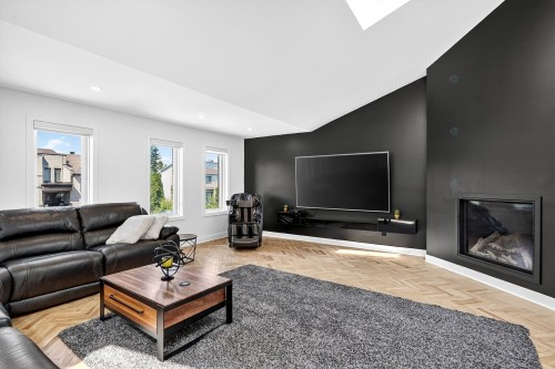 Salle familiale - 1623 Rue Michel-Gamelin, Laval (Vimont), QC - Indoor Photo Showing Living Room With Fireplace