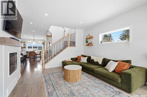 1041 4Th Street E, Saskatoon, SK - Indoor Photo Showing Living Room With Fireplace