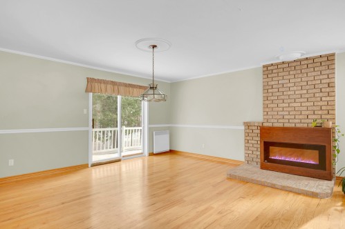Living Room - 1528 Mtée Sauvage, Prévost, QC - Indoor Photo Showing Living Room With Fireplace