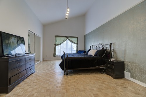 Chambre à coucher principale - 9001 Crois. Rimouski, Brossard, QC - Indoor Photo Showing Bedroom