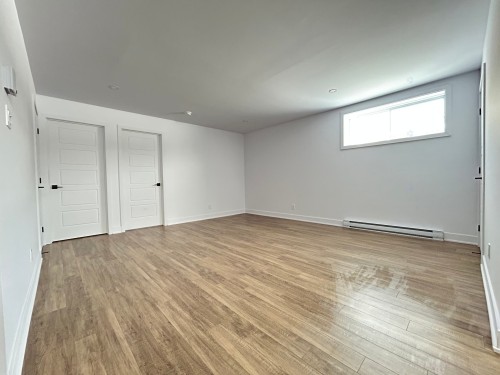 Salle familiale - 19 Rue De L'Hirondelle, Brownsburg-Chatham, QC - Indoor Photo Showing Other Room