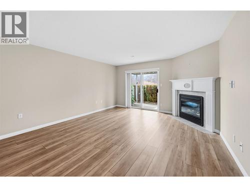 6514 Meadows Drive Unit# 3, Oliver, BC - Indoor Photo Showing Living Room With Fireplace