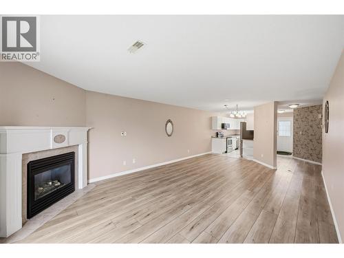6514 Meadows Drive Unit# 3, Oliver, BC - Indoor Photo Showing Living Room With Fireplace