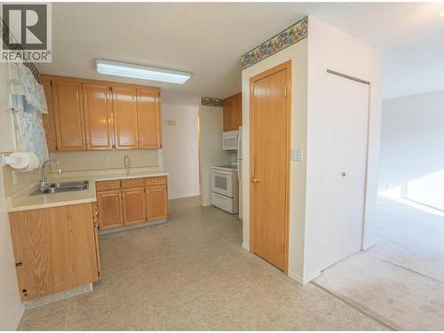 896 306Th Street, Kimberley, BC - Indoor Photo Showing Kitchen With Double Sink