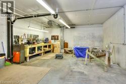 Garage featuring a workshop area - 